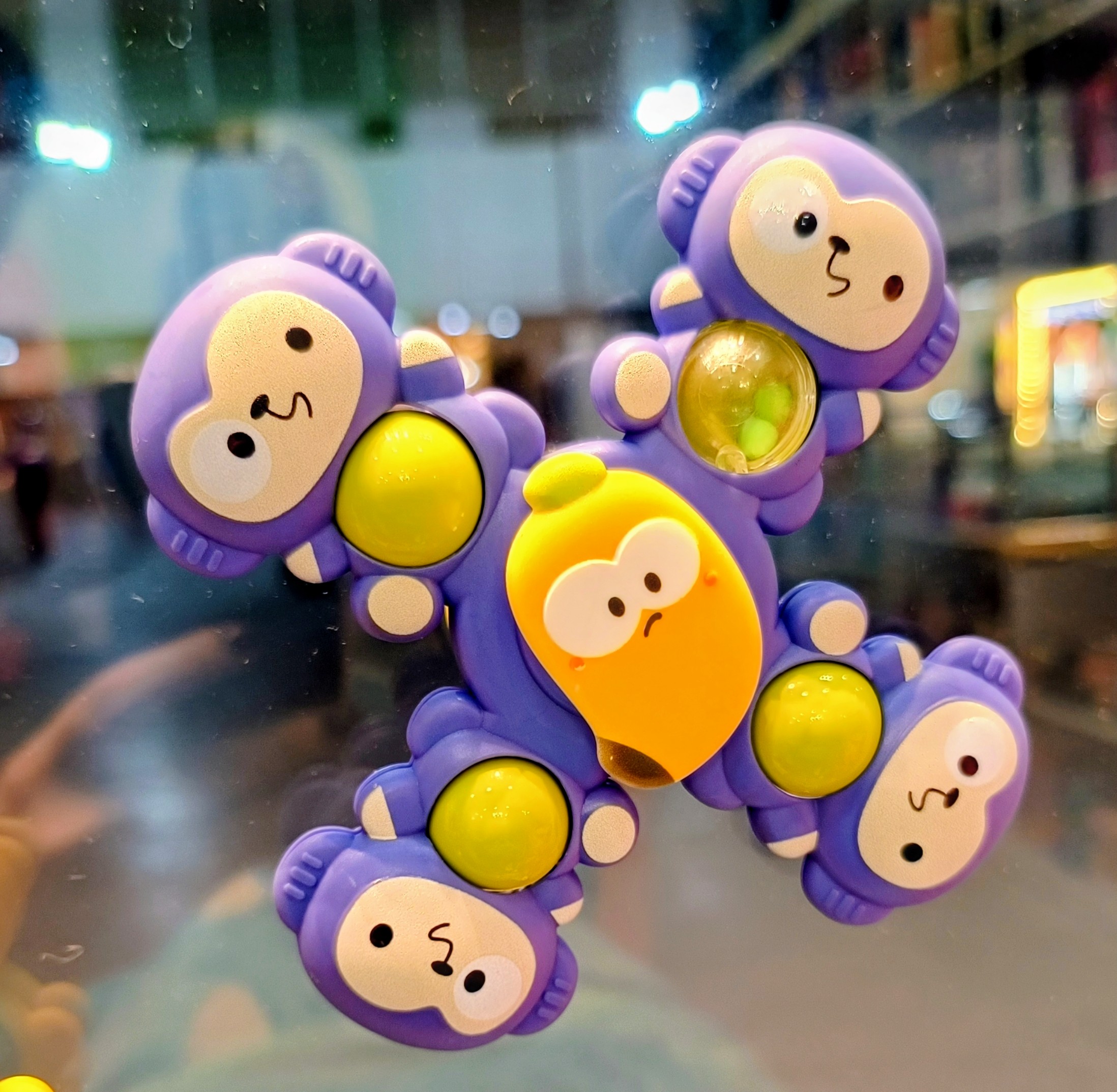 Colorful baby spinner toys with animal faces and suction base