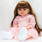 عروسک سیلیکونی با چهرهٔ واقعگرایانه و چشمان باز برای بازی کودکان