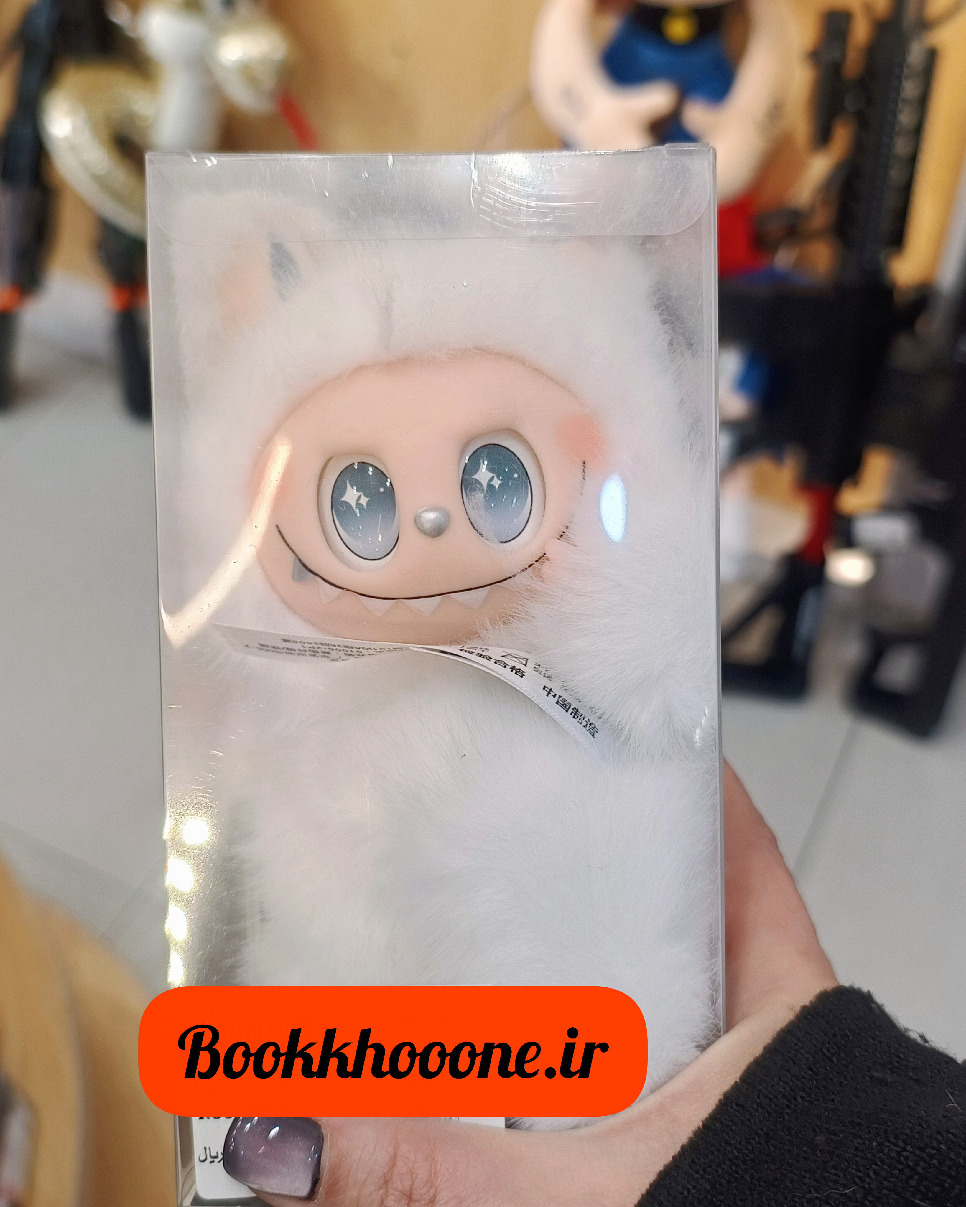 عروسک لبوبو آنجل با لباس خرگوشی قهوه ای و چهره لبخنددار