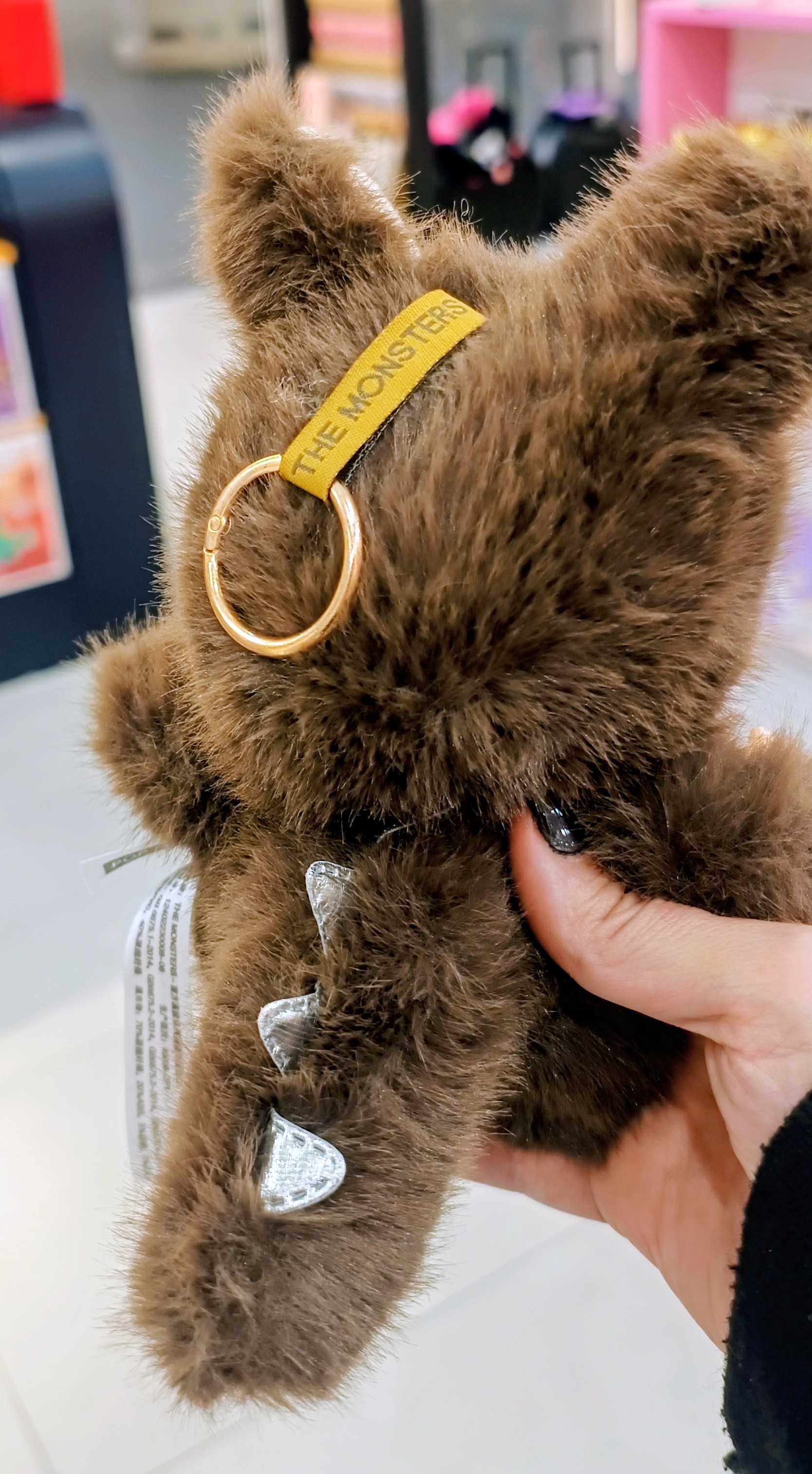 عروسک لبوبو آنجل با لباس خرگوشی قهوه ای و چهره لبخنددار