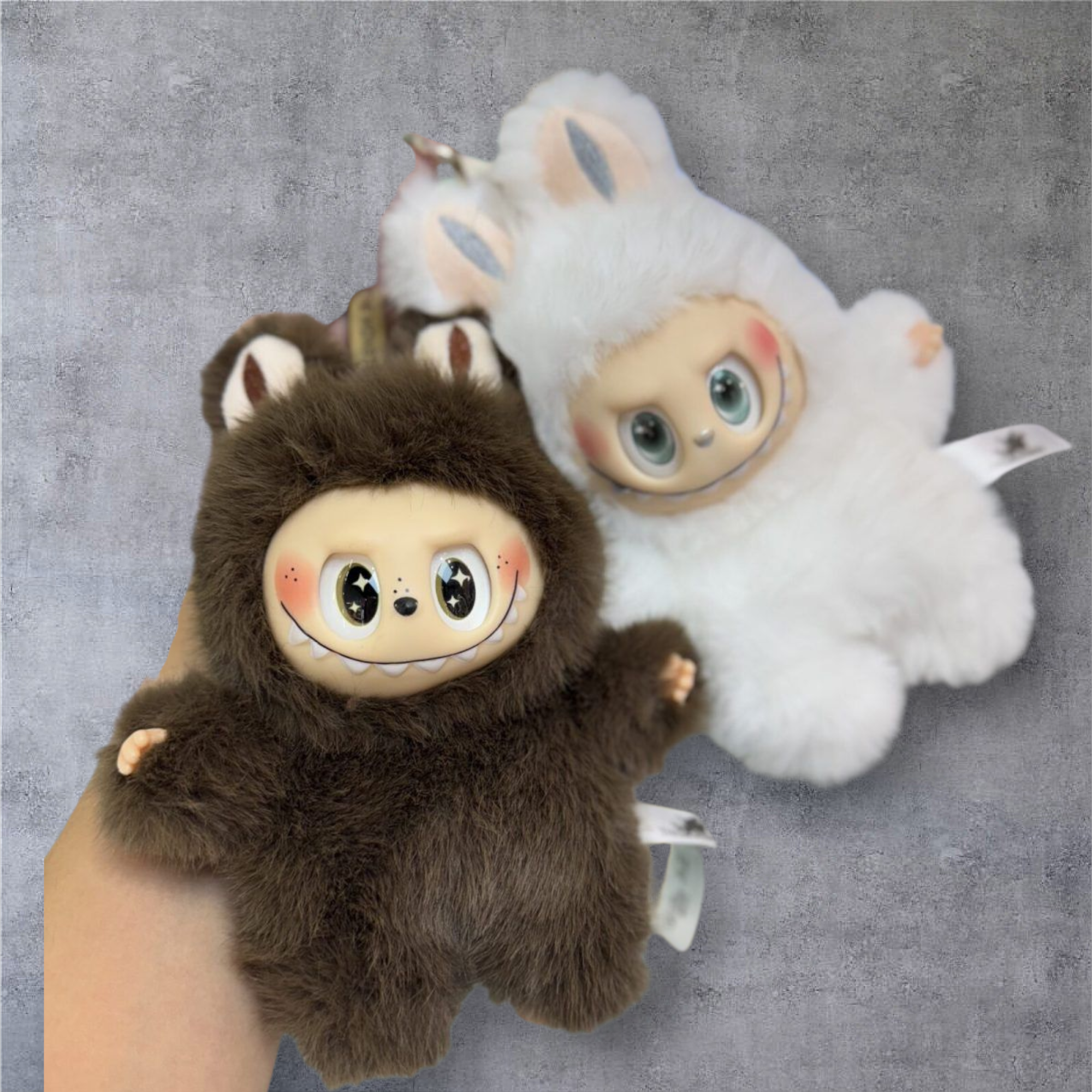 عروسک لبوبو آنجل با لباس خرگوشی قهوه ای و چهره لبخنددار